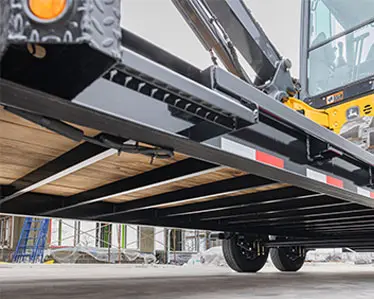 The Voyager Seamless I-Beam Equipment Trailer's undercarriage